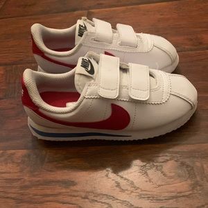 Red blue and white Nike Cortez
